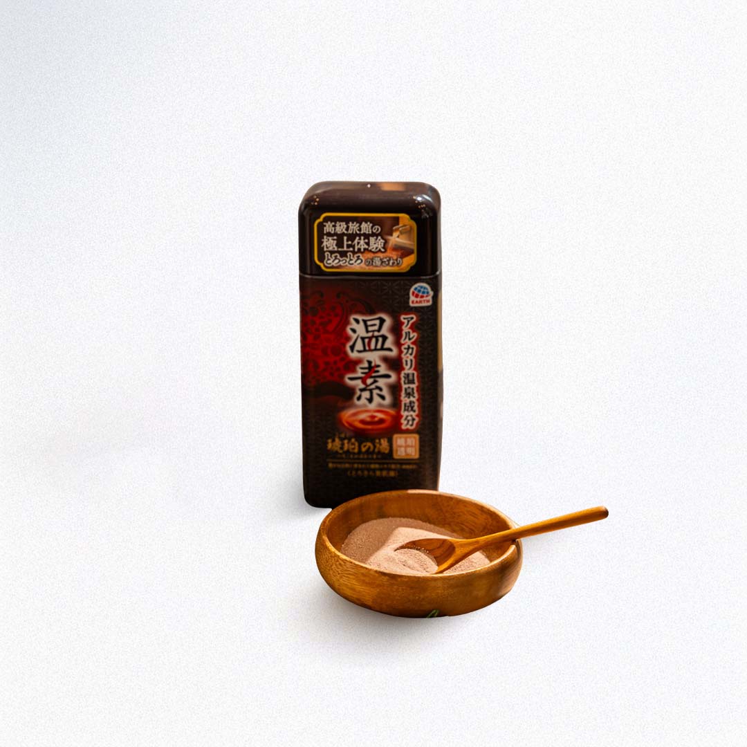 Bath salt packaging with a wooden bowl and spoon on a white background
