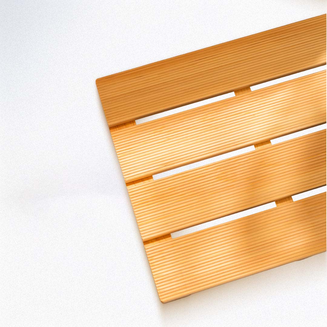 Wooden bath mat on a clean white background