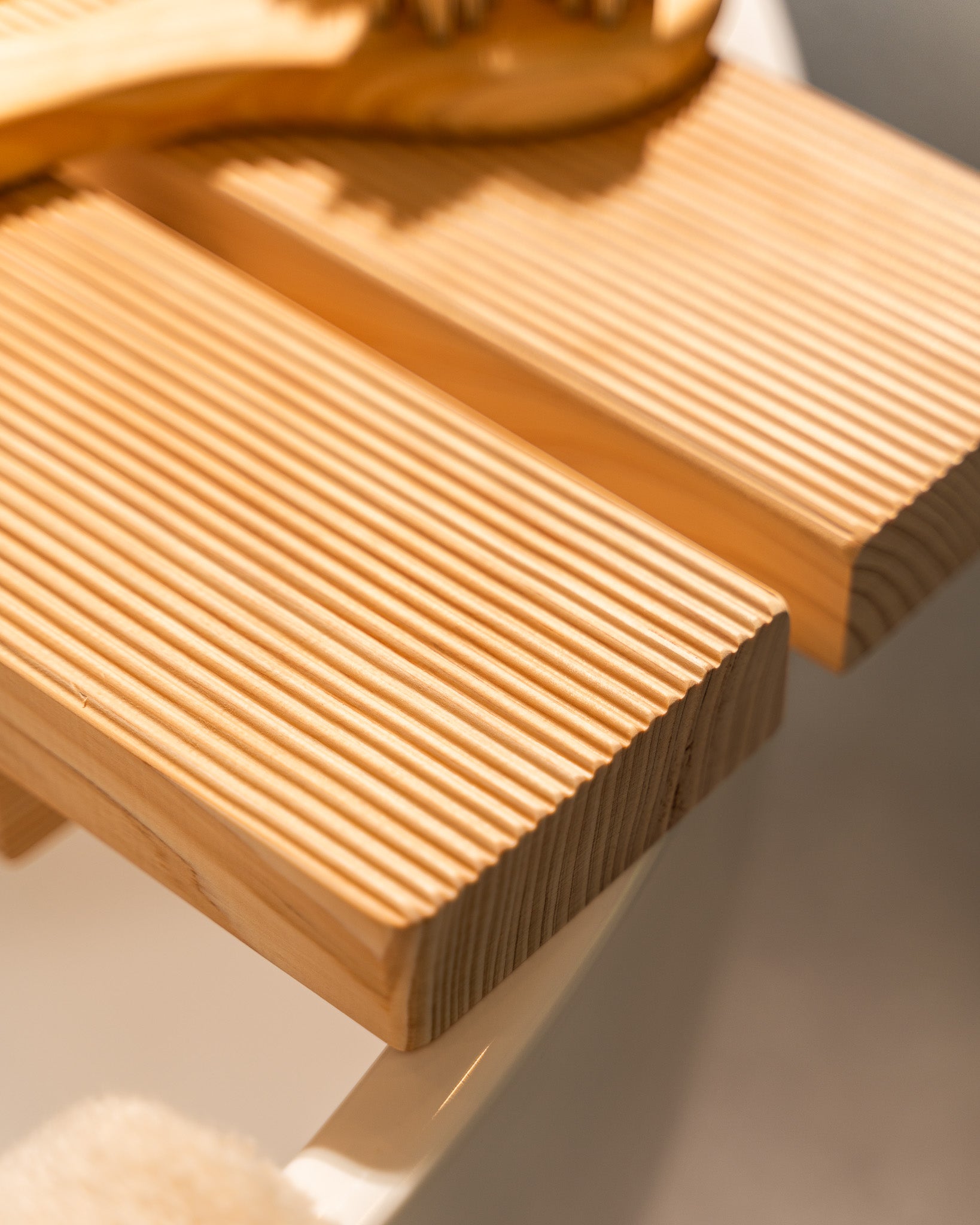 Close-up of a wooden deck board with visible grain pattern