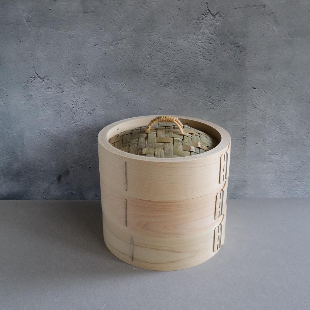 Three bamboo parts of a bamboo cooking steamer