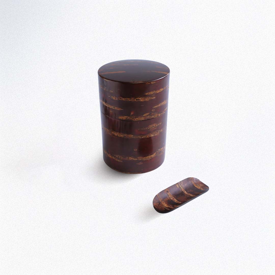 A cylindrical cherry bark tea on a white background.