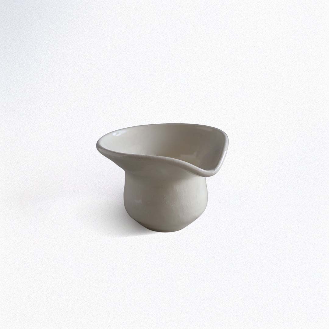 Gray ceramic sauce bowl on a white background