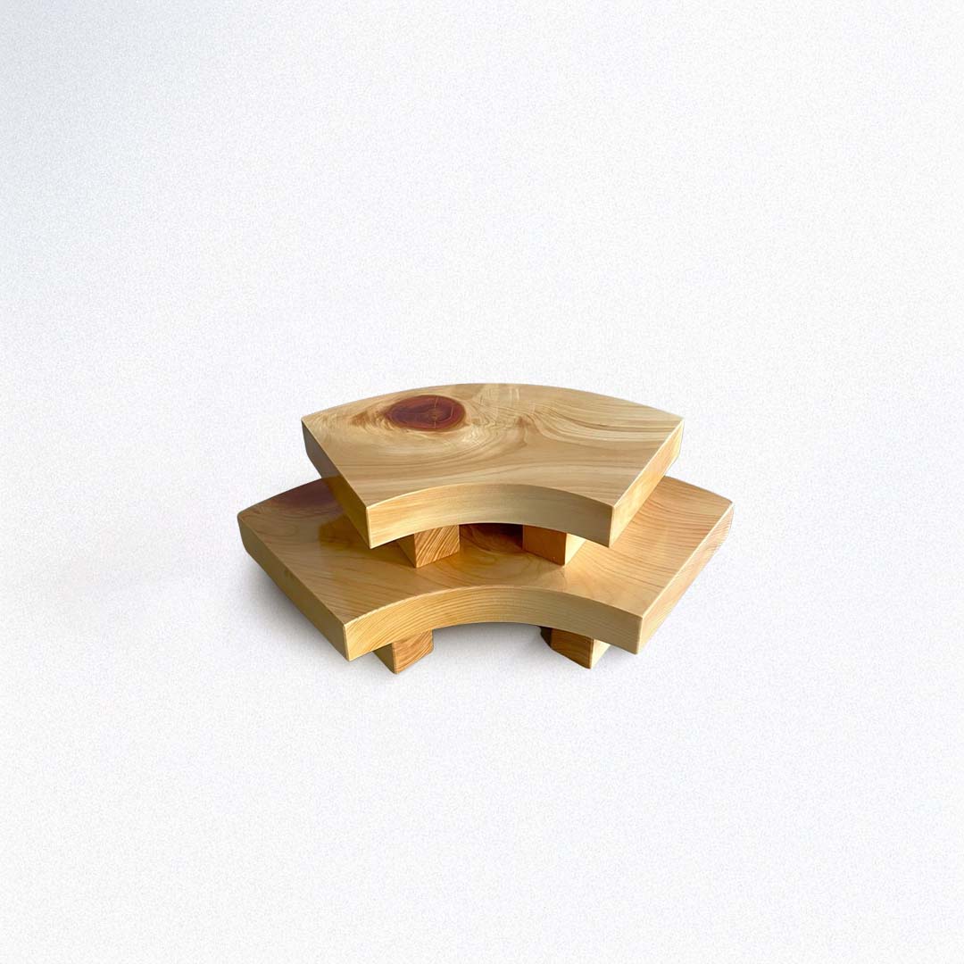 Wooden sushi tiered stand on a white background
