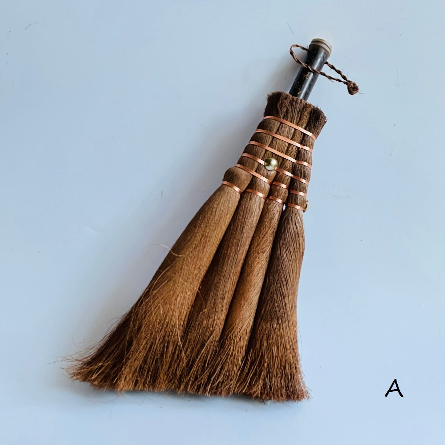 japanese dustpan on a grey surface