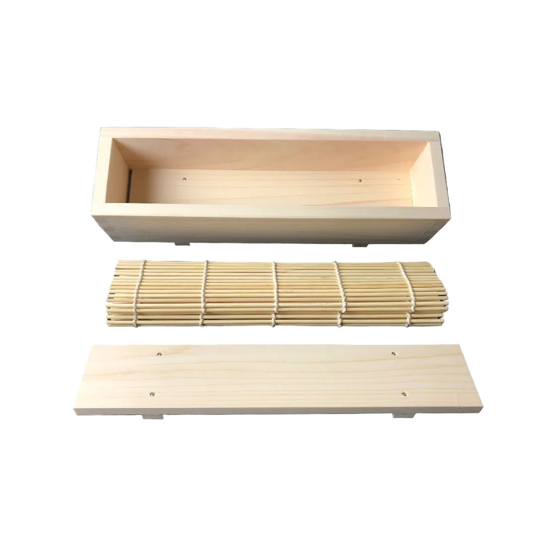 three elements of a sushi kit maker wooden box bamboo trail and wood plate