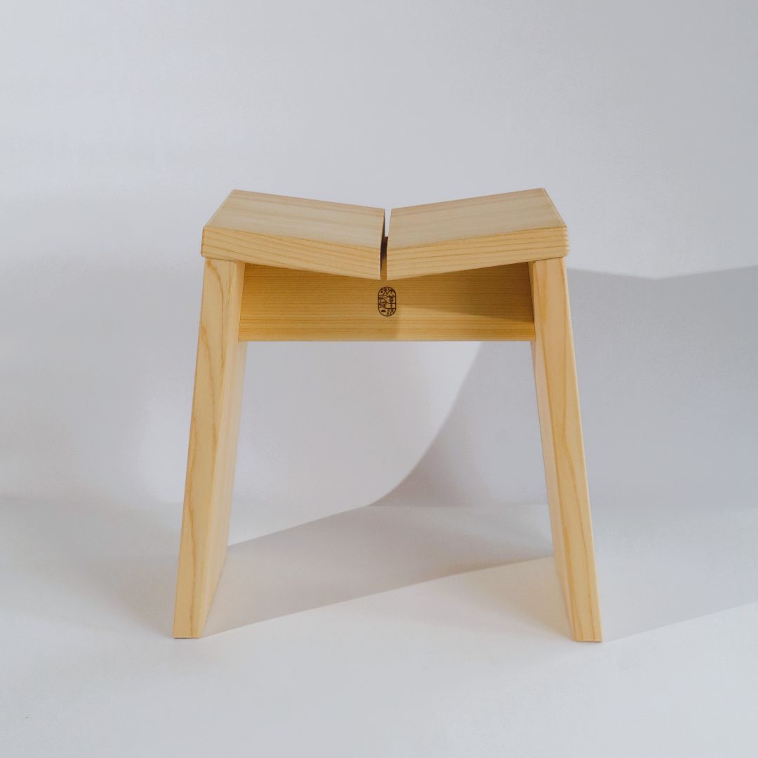 Wooden stool on a white background