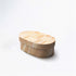 Wooden box with a woven lid on a white background