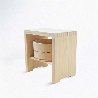 Hinoki wood bucket placed inside a Hinoki wood stool.