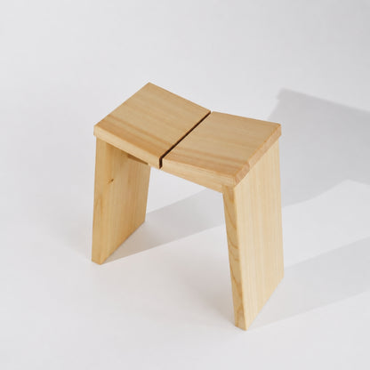 Wooden stool on a white background