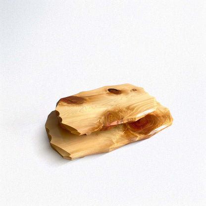 Two wooden sushi trays on a white background.