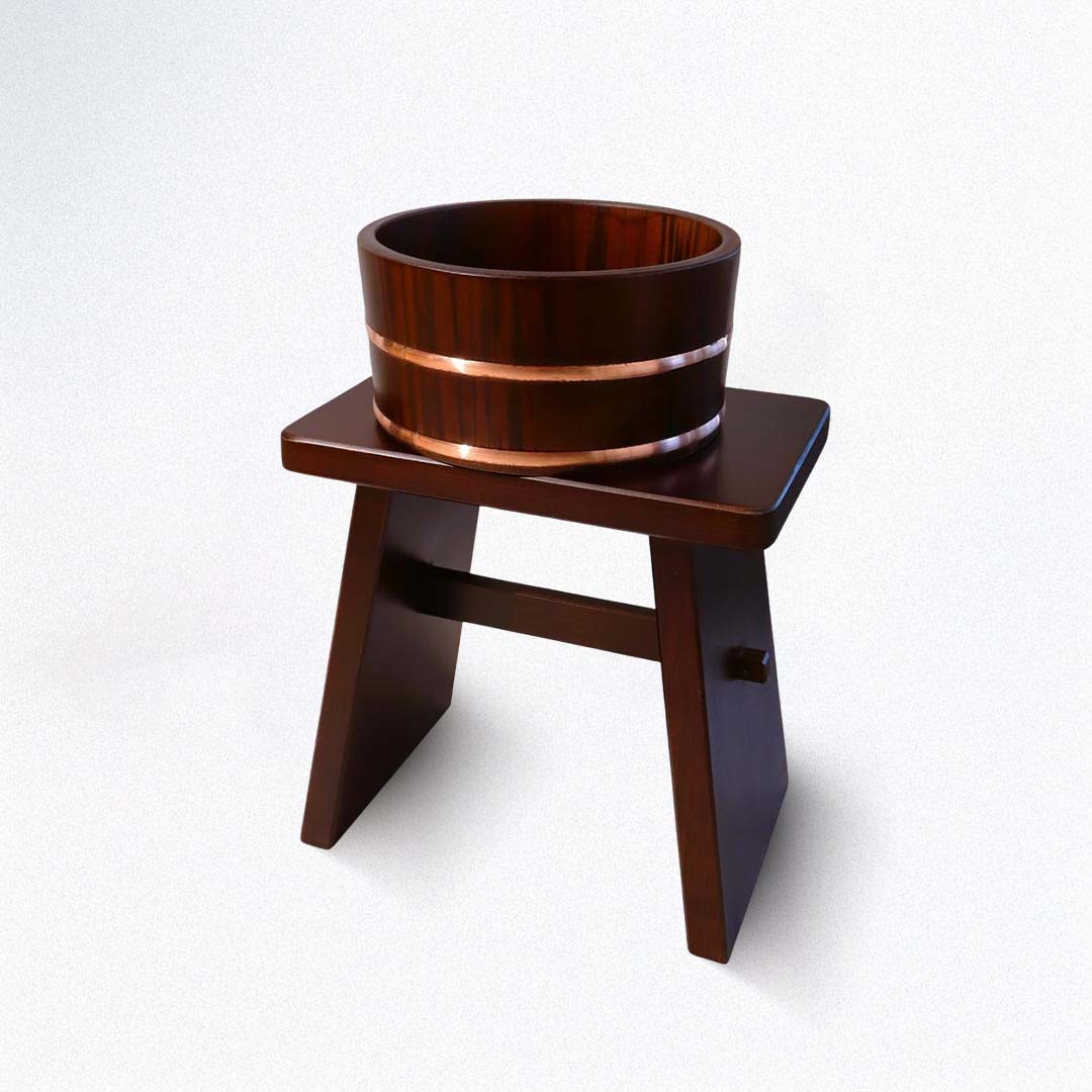 Wooden stool with a circular seat on a white background