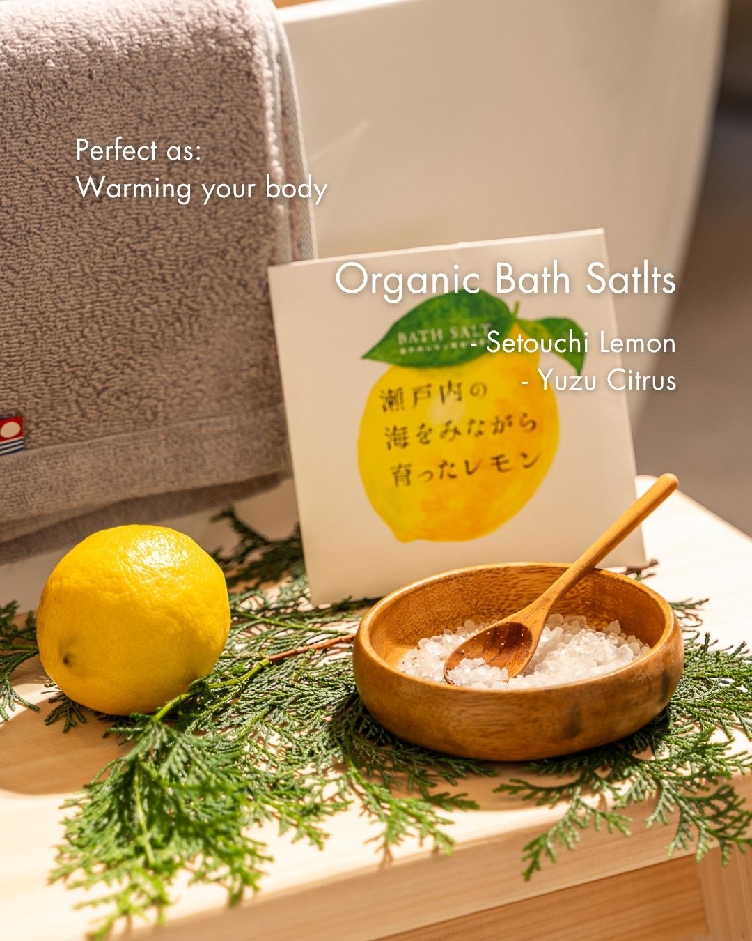 Organic bath salts with a lemon and wooden spoon on a wooden surface, featuring Selouchi Lemon Yuzu Citrus packaging.