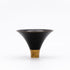 Black and gold lacquered bowl on a white background