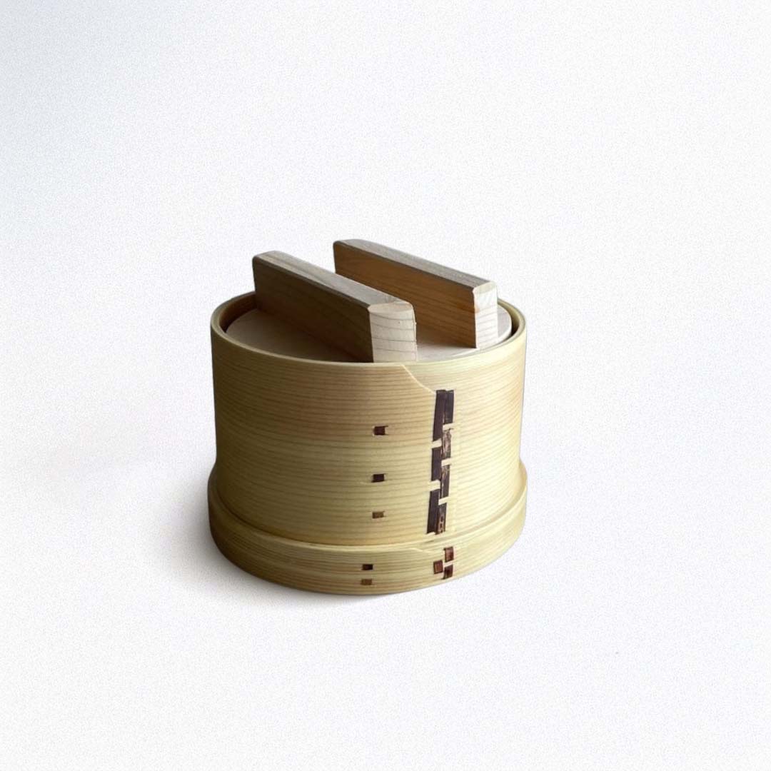 A closed lid wooden container, made of sawara cypress wood on a white background