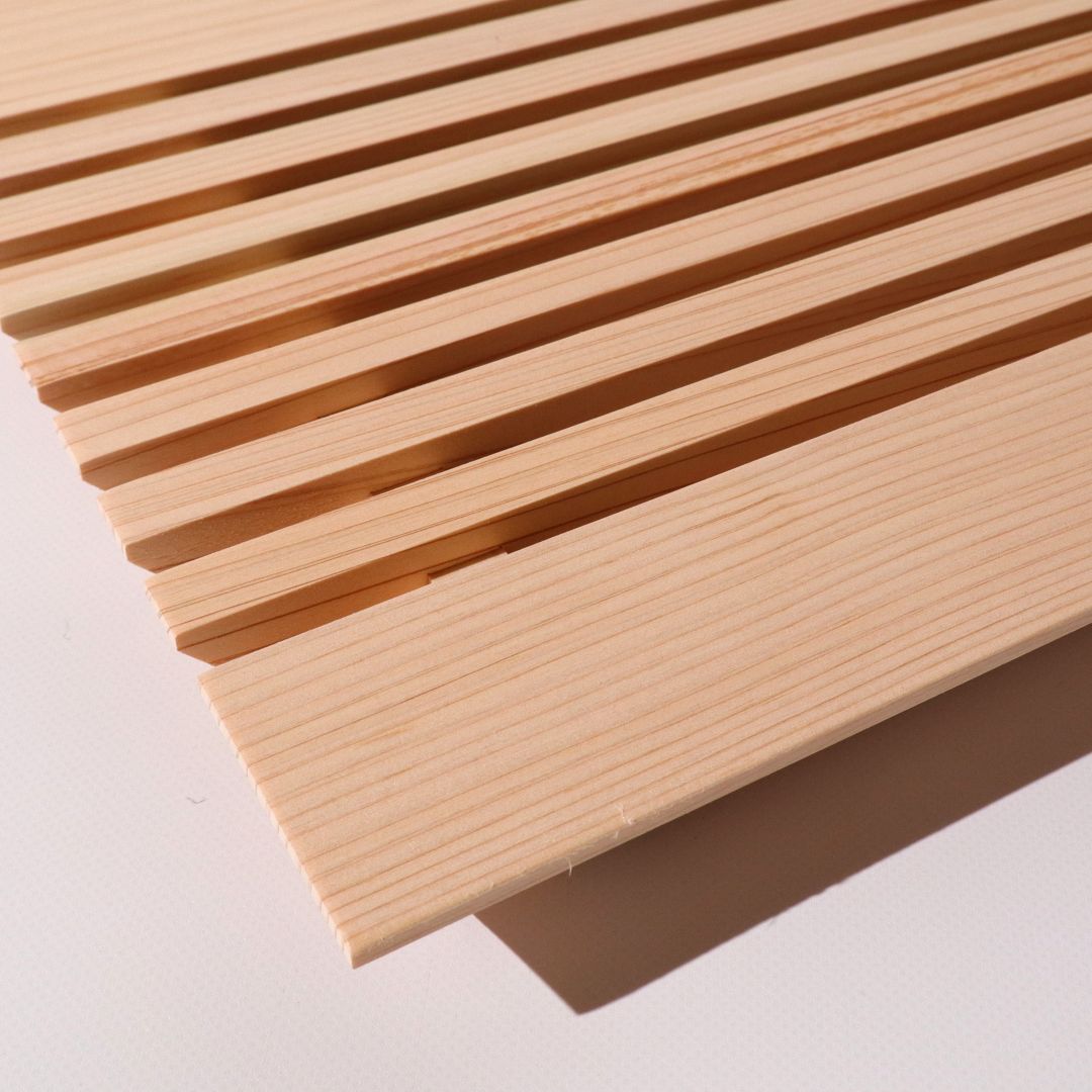 Close-up of wooden slats on a white background