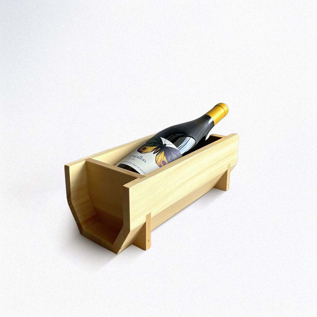 Wooden wine bottle holder with a wine bottle on a white background