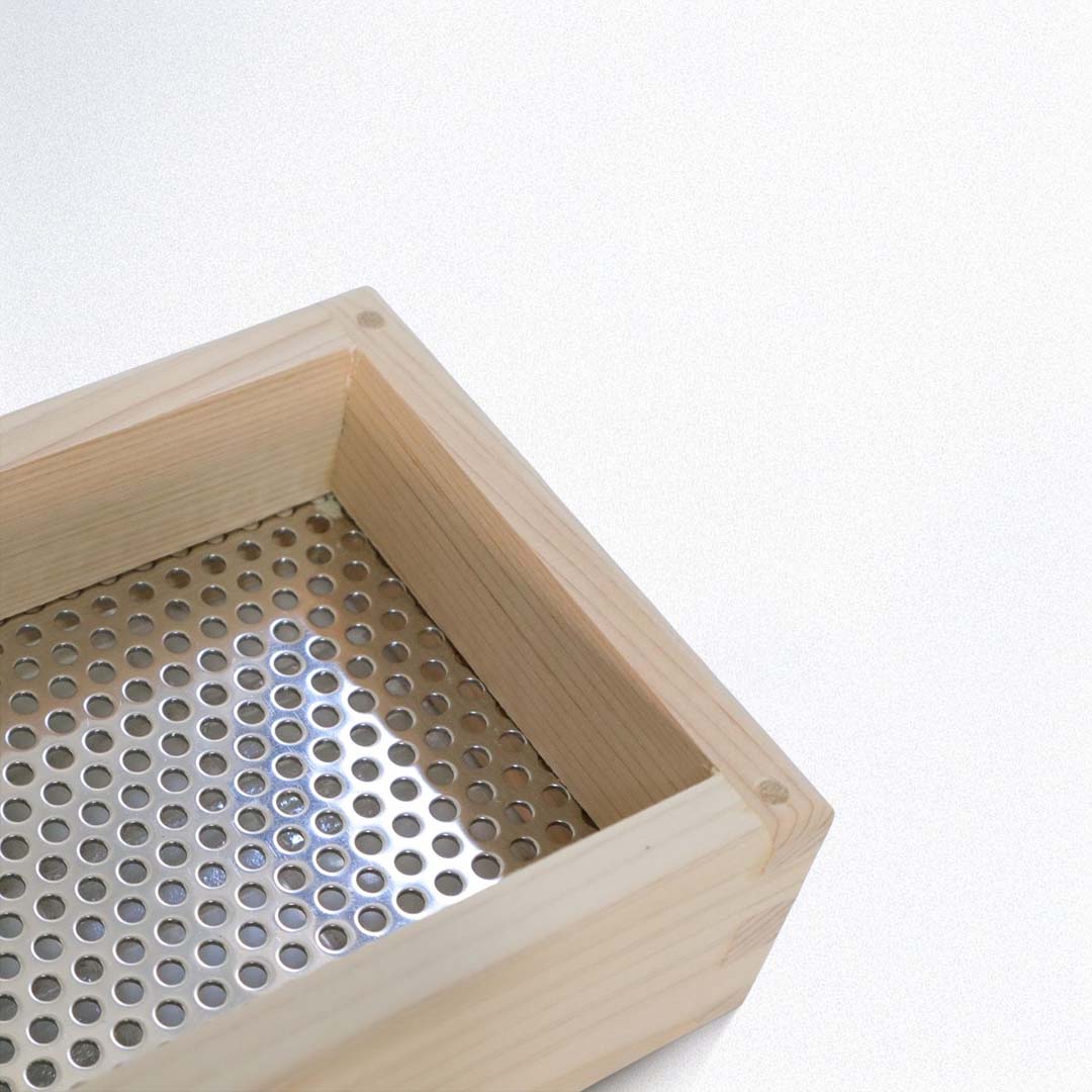 Wooden soap dish on a white background