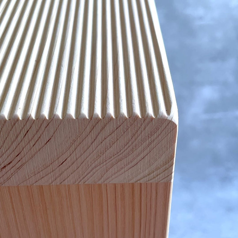 Wooden bath stool with a prominent border and sharp square angle