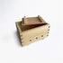 Wooden tofu maker with a lid on a white background