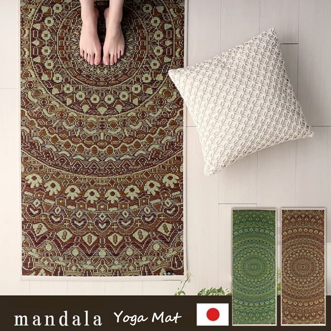 Patterned yoga mat with a white pillow on a tiled floor, featuring the brand &
