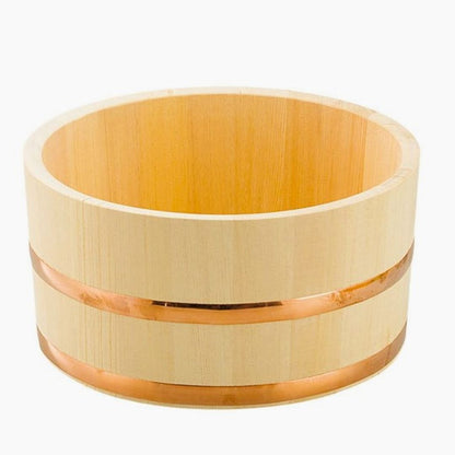 A wooden bath bucket with two copper rings around it set in a white background