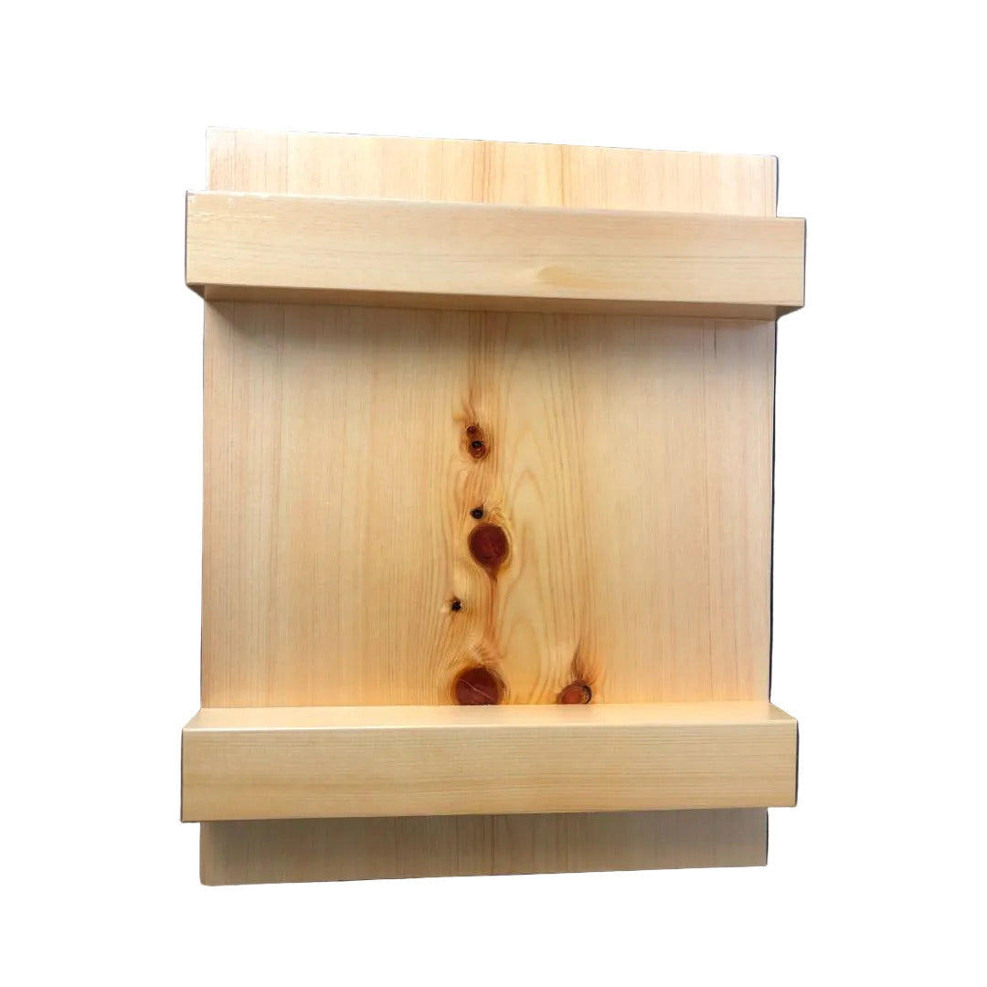 An image of an upside-down wooden sushi tray, with four wooden legs arranged in a bar-like formation, against a blue light surface. The bottom of the tray features a smooth and polished wooden surface with curved edges. The wooden legs are visible from this angle and appear to be sturdy and well-crafted. 