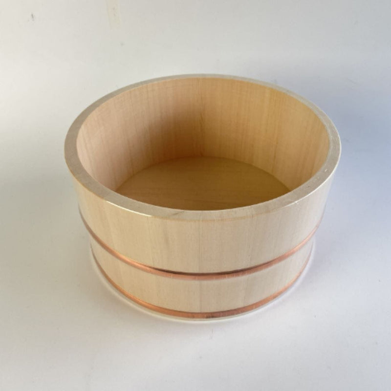 wooden bath bucket in a grey background