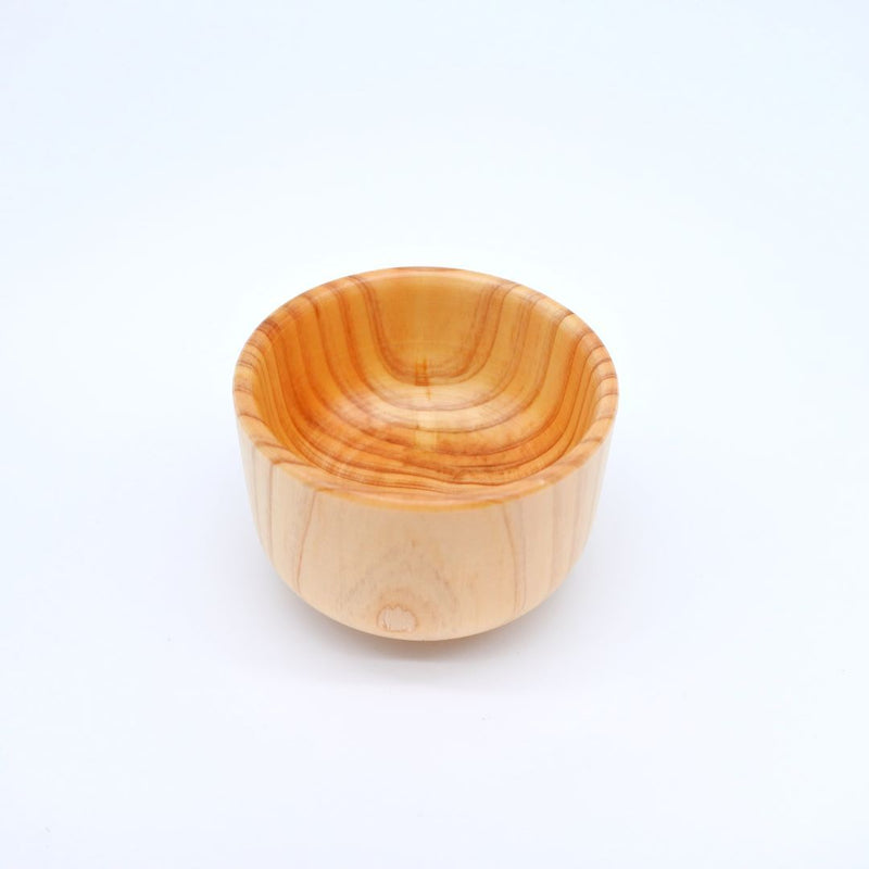 wooden sake cup from above on white background