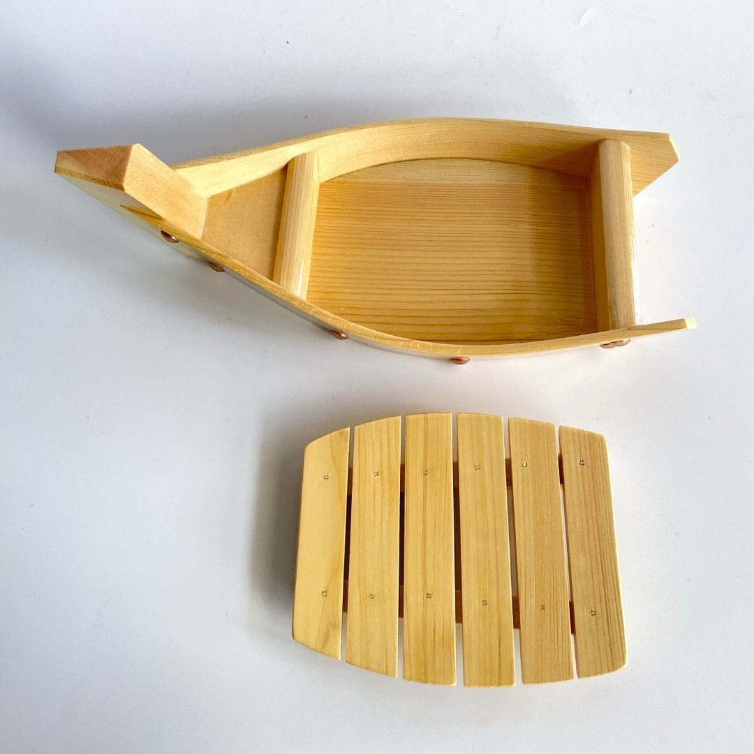 two parts of a wooden sashimi plate boat